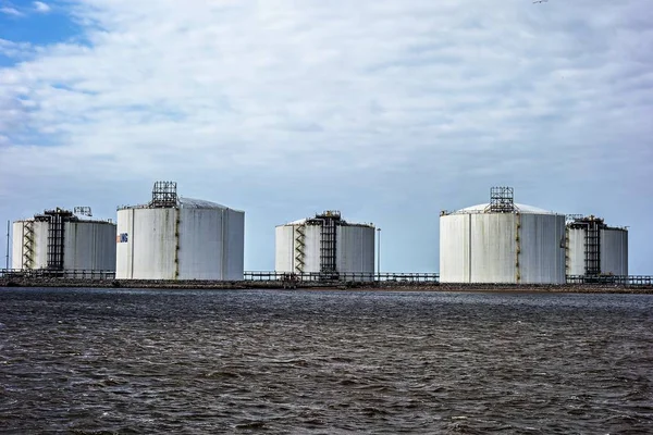 industria oil storage tanks on the water front