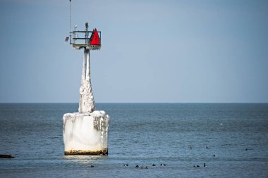lighthouses and buoys on coast near cleveland ohio lake erie clipart