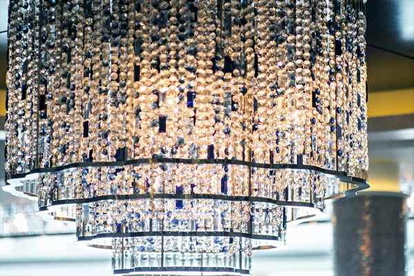 Chandelier hanging in fine dining restaurant — Stock Photo, Image