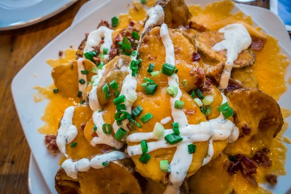 baked potato slices with melted cheese appetizer