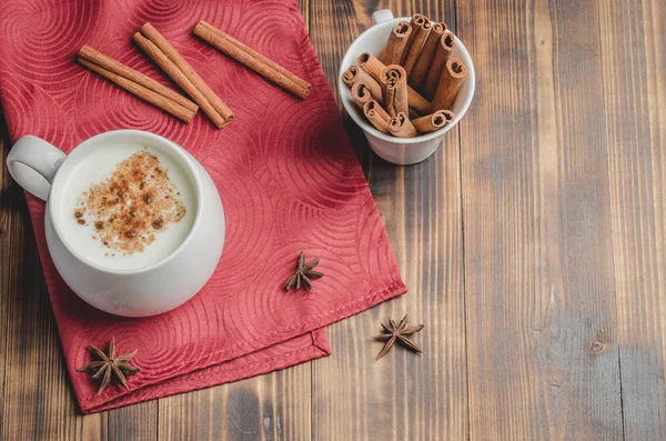 Eggnog. Traditional christmas cocktail in a white mug with cinna — Stock Photo, Image