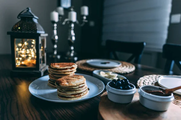 Stack of pancakes with fresh blueberry and raspberry. Stock Picture