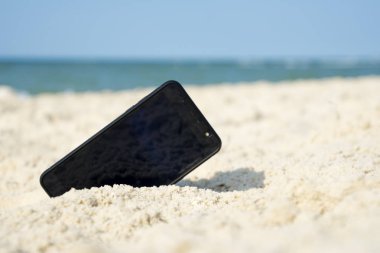 Mobil dokunmatik telefon kum plaj
