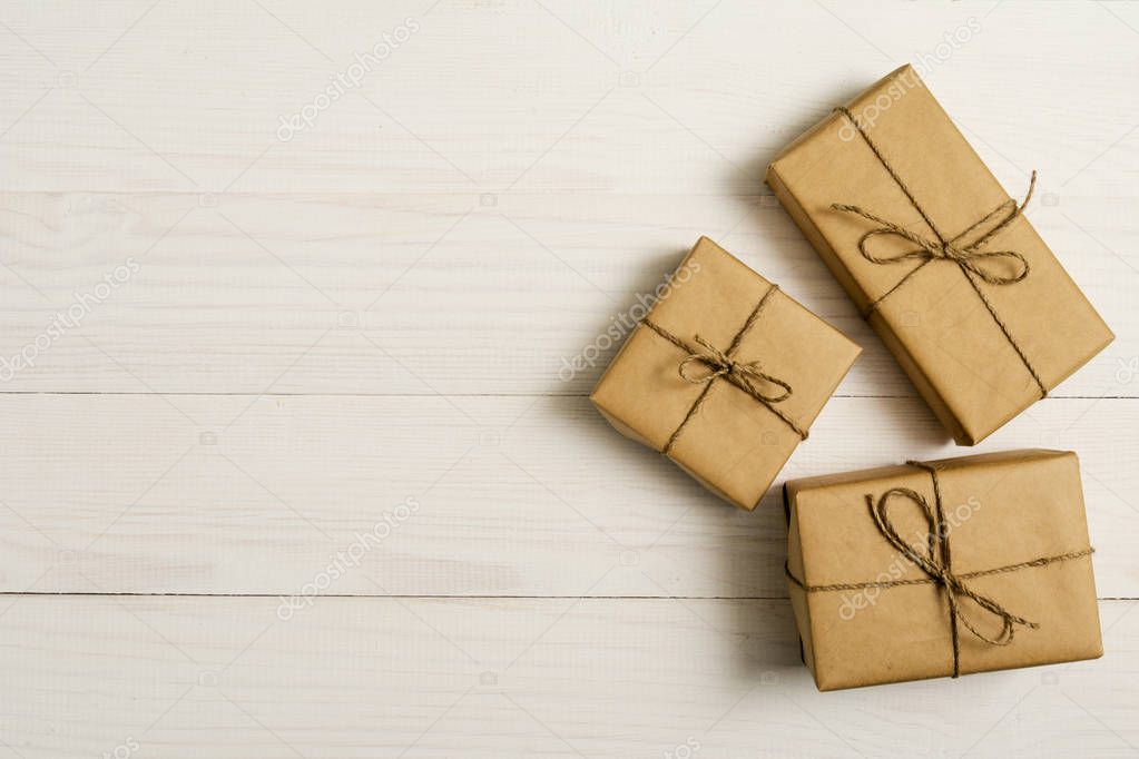 gift boxes package on white wooden background