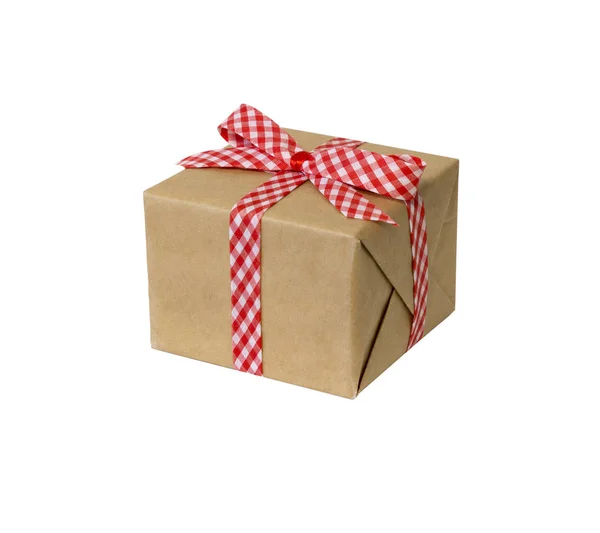 Wrapped vintage gift box with red ribbon bow, isolated on white — Stock Photo, Image