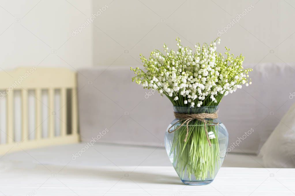 Living room interior design with still life, blossom flowers in vase