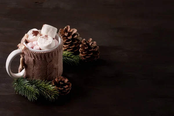 Hot chocolate drink with marshmallows for cold weather. Christmas and new year celebration concept with copy space