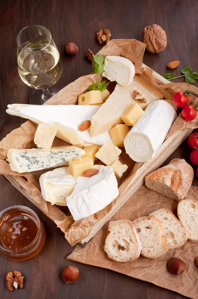 Variety Different Cheese Wine Fruits Nuts Camembert Goat Cheese Roquefort — Stock Photo, Image