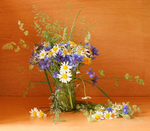 Beautiful bouquet of wild flowers in vase