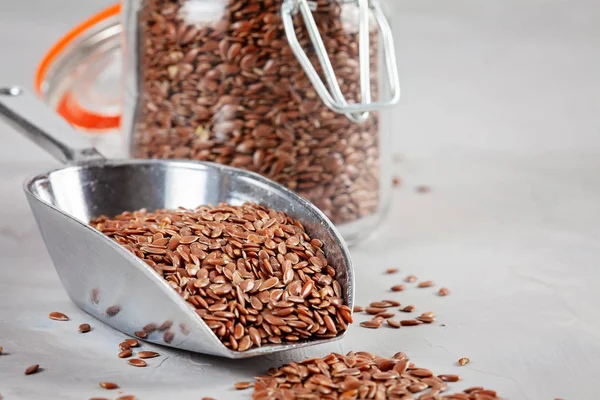 Flax seeds rich in healthy fats, plant-based protein and various minerals. Healthy food concept. Vegan, vegeterian balanced diet reducing risk of Heart Disease