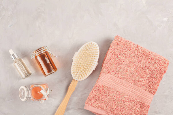 Various spa related objects on gray background, top view