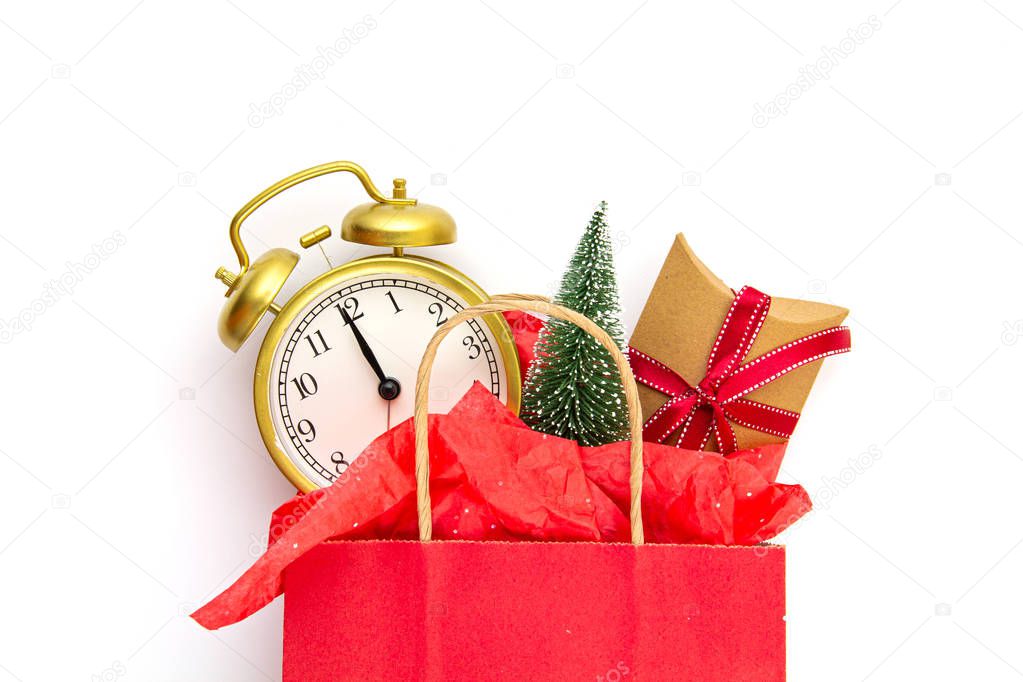 Paper bag with christmas gifts, christmas tree and decoration