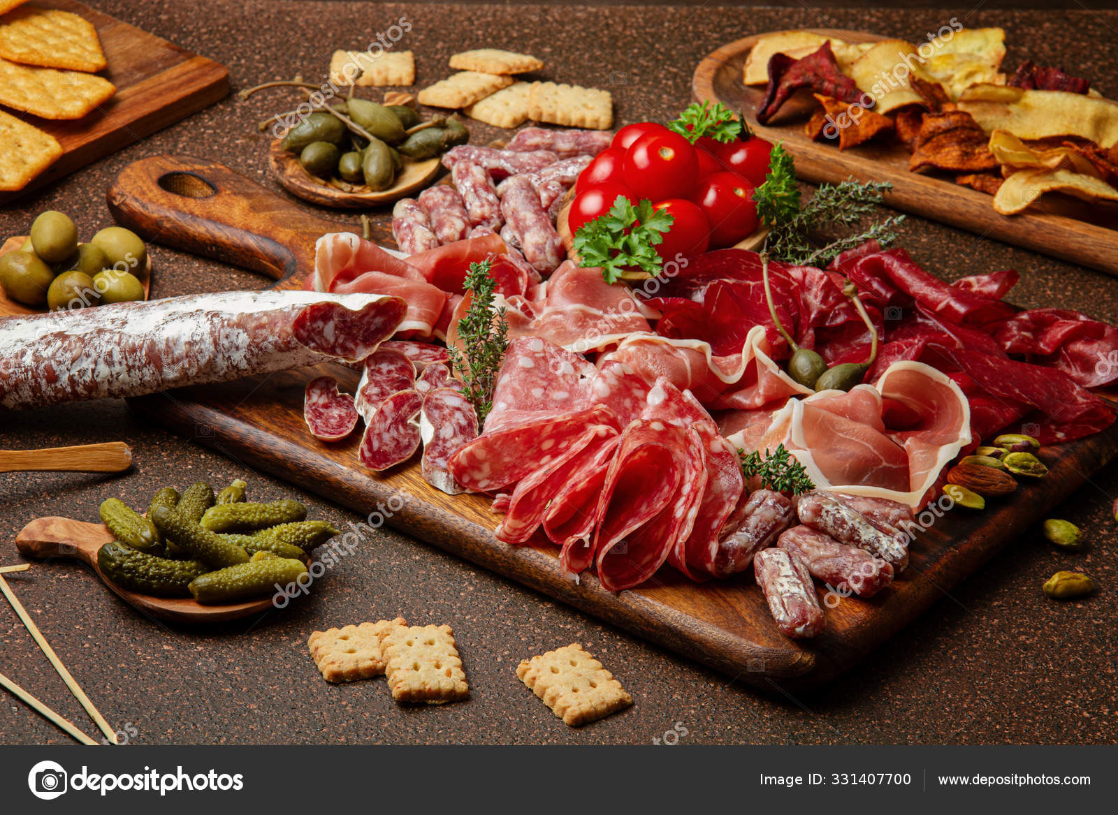 Appetizers table with differents antipasti, cheese, charcuterie