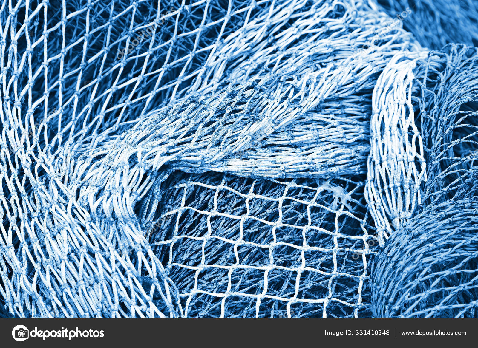 Abstract background with fishing net texture toned in blue monoc