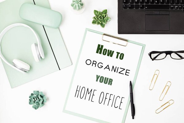 Top view of office desk. Table with laptop and office supplies. Flat lay home office workspace, remote work, distant learning, video conference, calls concept 