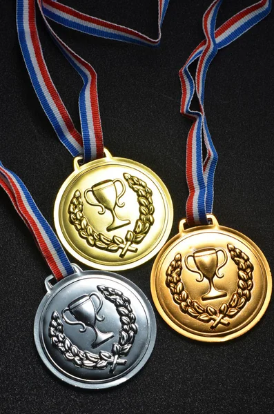 Gold, silver and bronze medals Stock Image