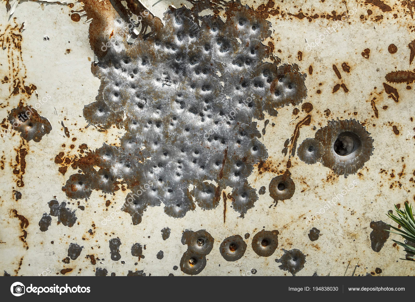 Bullet holes in a rusty metal sheet Stock Photo by ©4solidwork.gmail