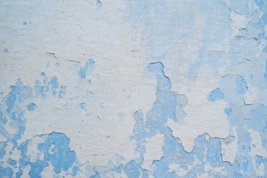 Çizikler ve çatlaklar ile beyaz mavi duvar