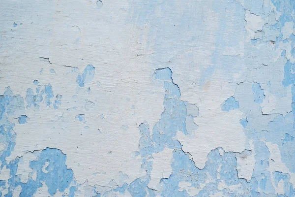 White blue wall with scratches and cracks — Stock Photo, Image
