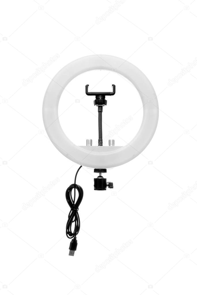 Closeup of circular neon LED lamp isolated white background. Pop