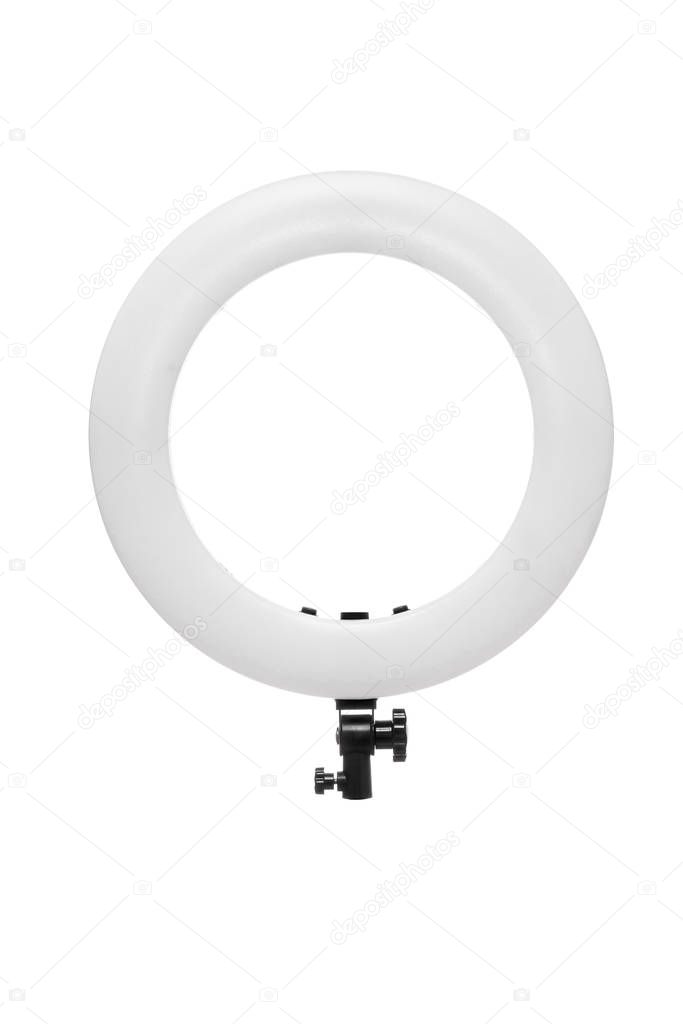 Closeup of circular neon LED lamp isolated white background. Pop