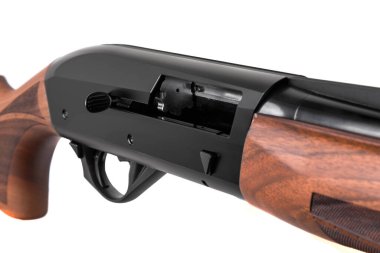 12-caliber shotgun for sports, recreation and hunting. Semi-automatic shotgun with a wooden butt and forearm isolated on white background