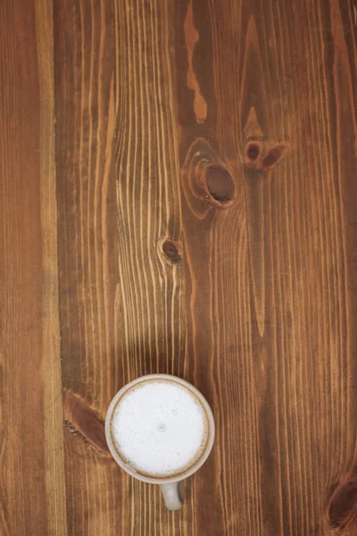 Tasse Kaffee Auf Dem Braunen Holzgrund — Stockfoto