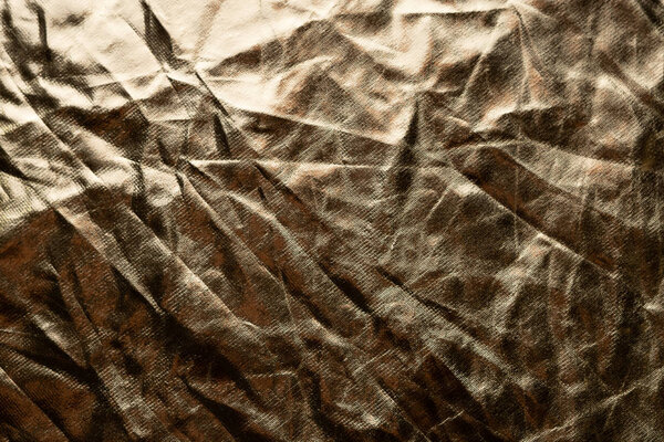 Silver and bronze foil reflector. Selective focus. Creative vint