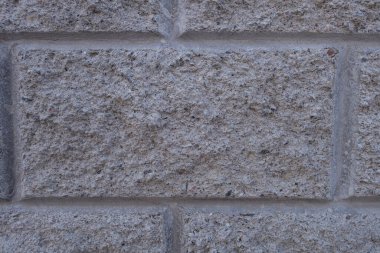 Gri tuğla duvar. Yırtık beton yapı. Yaratıcı vintage arkaplan.