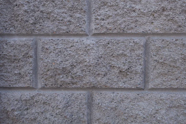 Серый кирпичный вал. Разорванная бетонная конструкция. Творческий винтажный фон . — стоковое фото