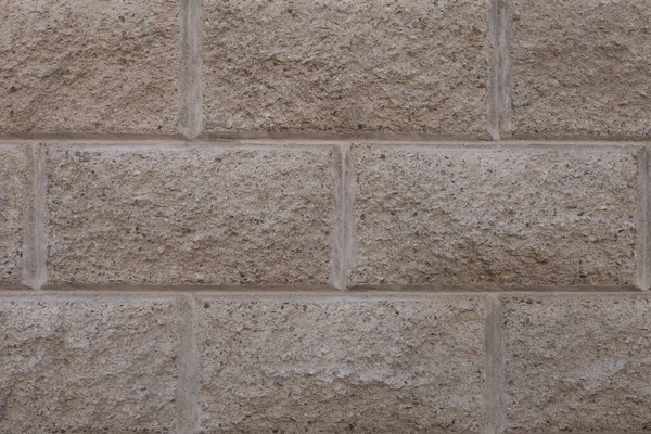 Szara ceglana ściana. Rozdarta betonowa konstrukcja. Kreatywne tło vintage. — Zdjęcie stockowe
