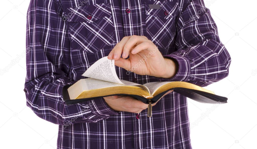Man holding a Bible, isolated on white background