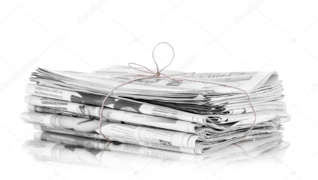 Pile of newspapers, isolated on white