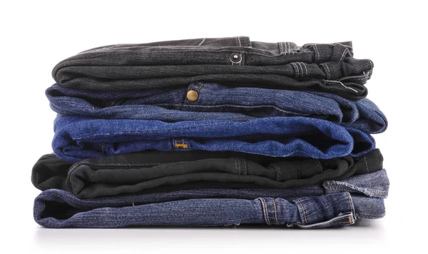 Stack Olika Jeans Isolerad Vit Royaltyfria Stockbilder