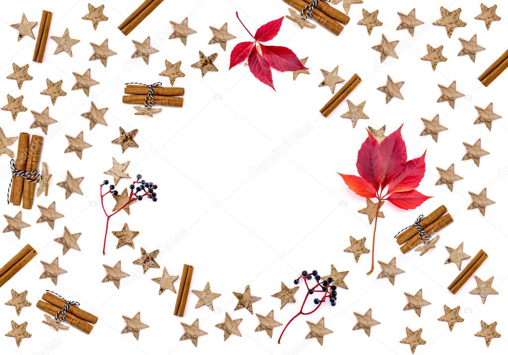 Christmas composition. Christmas wreath on white background. Flat lay, top view, copy space. Autumn composition. Dried red leaves, rowan berries on white background. Autumn, fall, halloween, thanksgiv