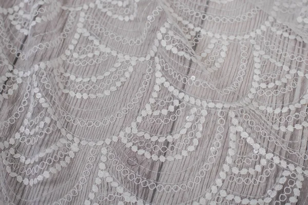 Texture, sfondo, motivo. tessuto pizzo bianco. Questo meraviglioso pizzo è perfetto per il vostro design, gioielli da sposa, questo pizzo ha una bella trama ricca e si sente ad esso. — Foto Stock