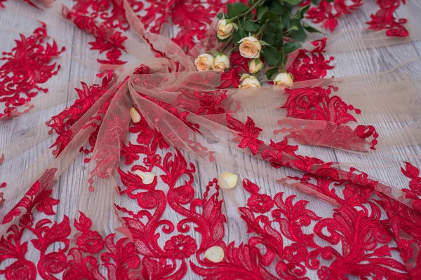 The texture of lace on wooden background — Stock Photo, Image