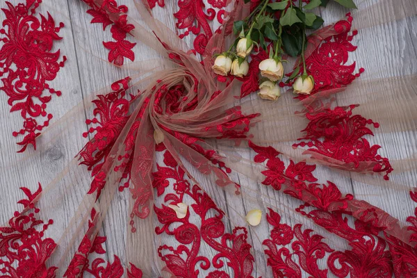 The texture of lace on wooden background — Stock Photo, Image