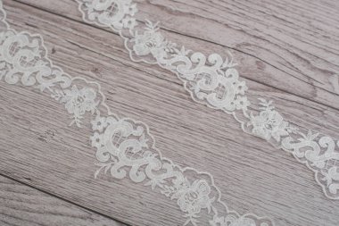 doku, arkaplan, desen. beyaz dantel kumaş. Bu harika dantel tasarım ve düğün takıların için mükemmel, bu dantelin çok güzel ve zengin bir dokusu var..