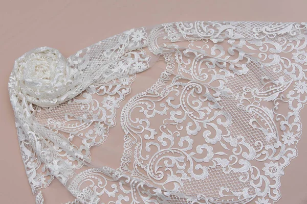 Texture lace fabric. lace on white background studio. thin fabric made of yarn or thread. a background image of ivory-colored lace cloth. White lace on beige background. — Stock Photo, Image