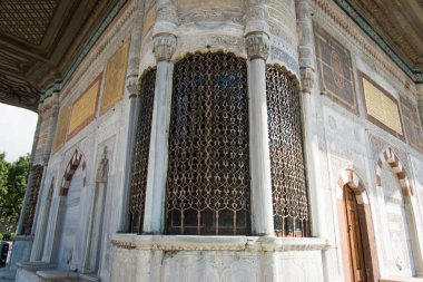 Istanbul / Turkey - July 6, 2019 : Hagia Sophia exterior city skyline museum architecture tourists people daytime clear blue sky