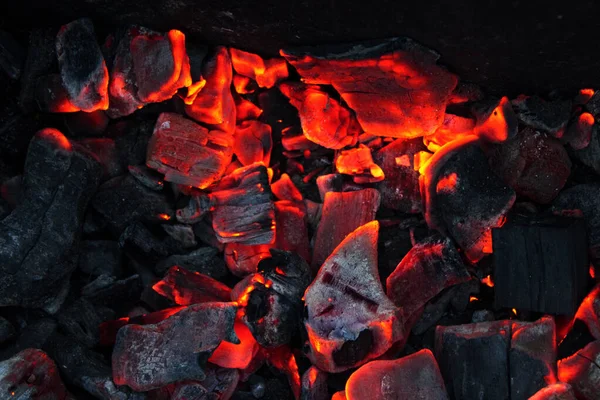 Burning charcoal as a background — Stock Photo, Image