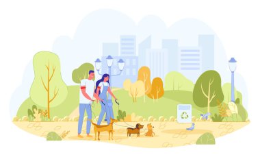 Erkek ve Kadın Gönüllüler Park 'ta Köpekleri Yürütüyor