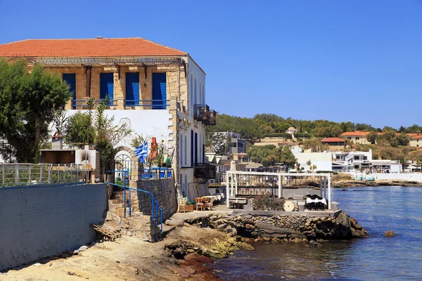 Old houses and tavern on sea coast near Rethymno, Crete, Greece — Stock Photo, Image