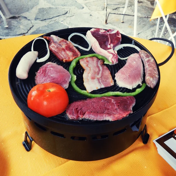 Raclette with meat and vegetables — Stock Photo, Image