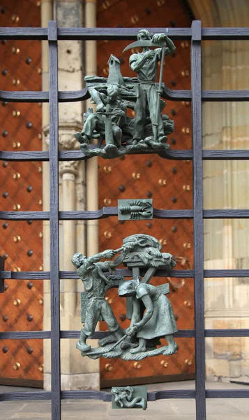 Small cast iron figures on the cathedral of St. Vitus in Prague — Stock Photo, Image