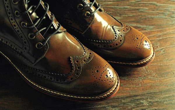 Brown shoes on wood background — Stock Photo, Image