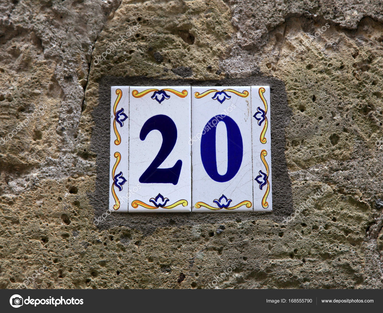 House number twenty 20 ceramic tiles with blue figures on old