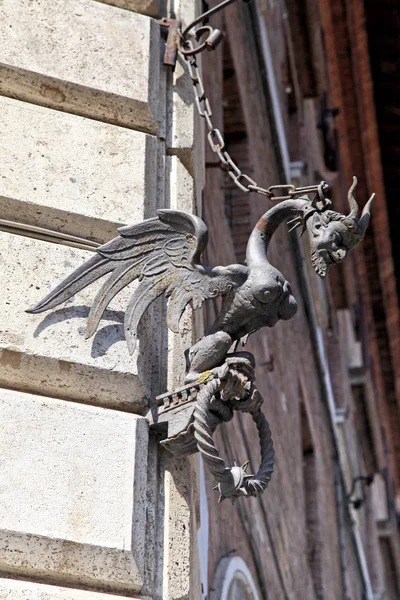 Medieval architectural detail with devil figure — Stock Photo, Image
