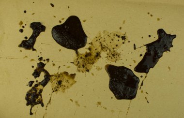 Kahverengi kahve lekeleri kağıtta. Soyut arkaplan veya doku